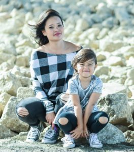 picture of owner and her daughter to show members of the Yogi Cubs team