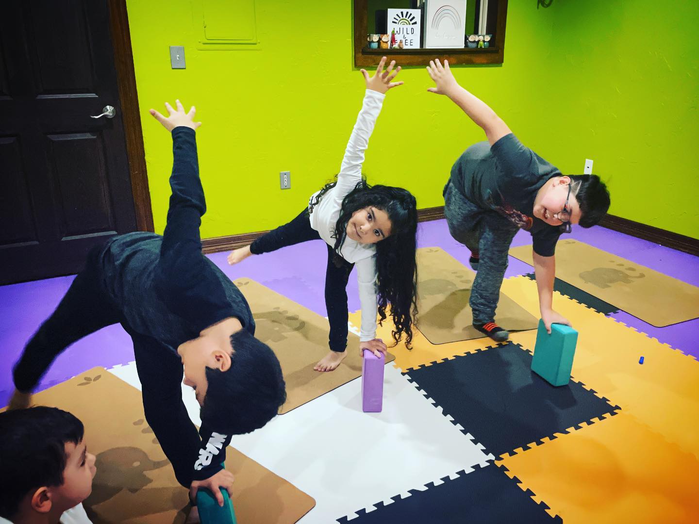 Proud of our #yogicubs for focusing on our peak pose of the week after our holiday break! Half moon pose requires so much body awareness as we engage our lower body & core muscles to find a moment of stability. They did amazing!

#mansfieldtx #dfwkids #yogaforkids #strongkids #balance #halfmoonpose #arlingtontx